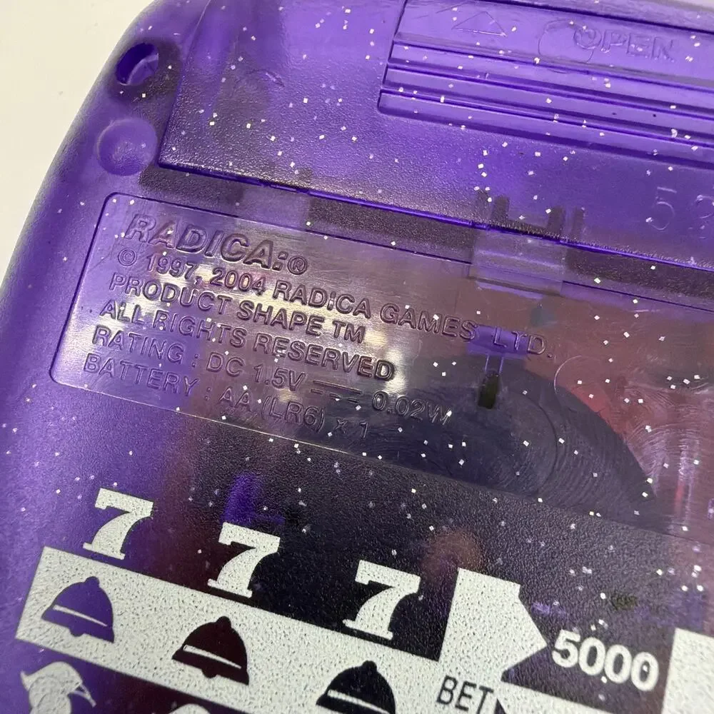 Radica Pocket Slot Handheld Electronic Game Translucent Purple Tested Working